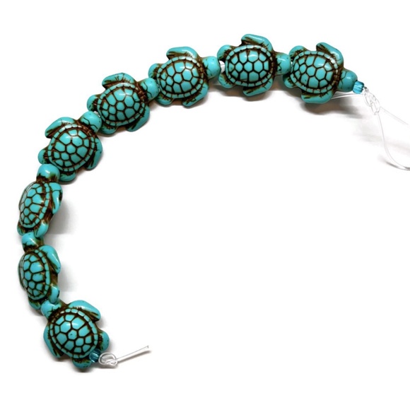 As Low As $2 Turquoise Synthetic Turquoise Turtle Beads 22mm x 13mm (8) - Picture 2 of 2